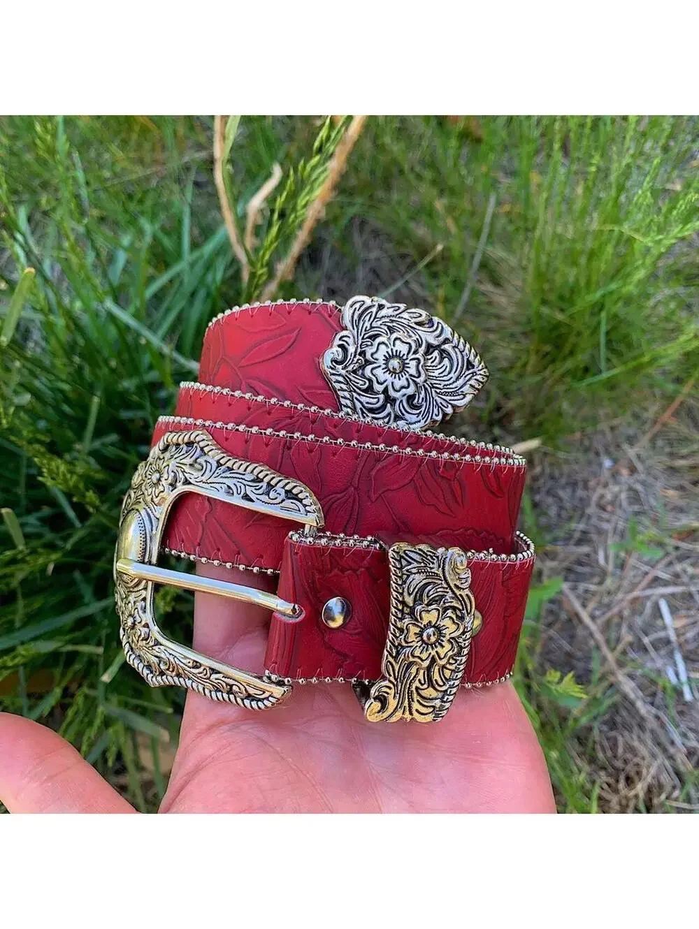 Red Western Floral belt with silver belt buckle. 38 inches length